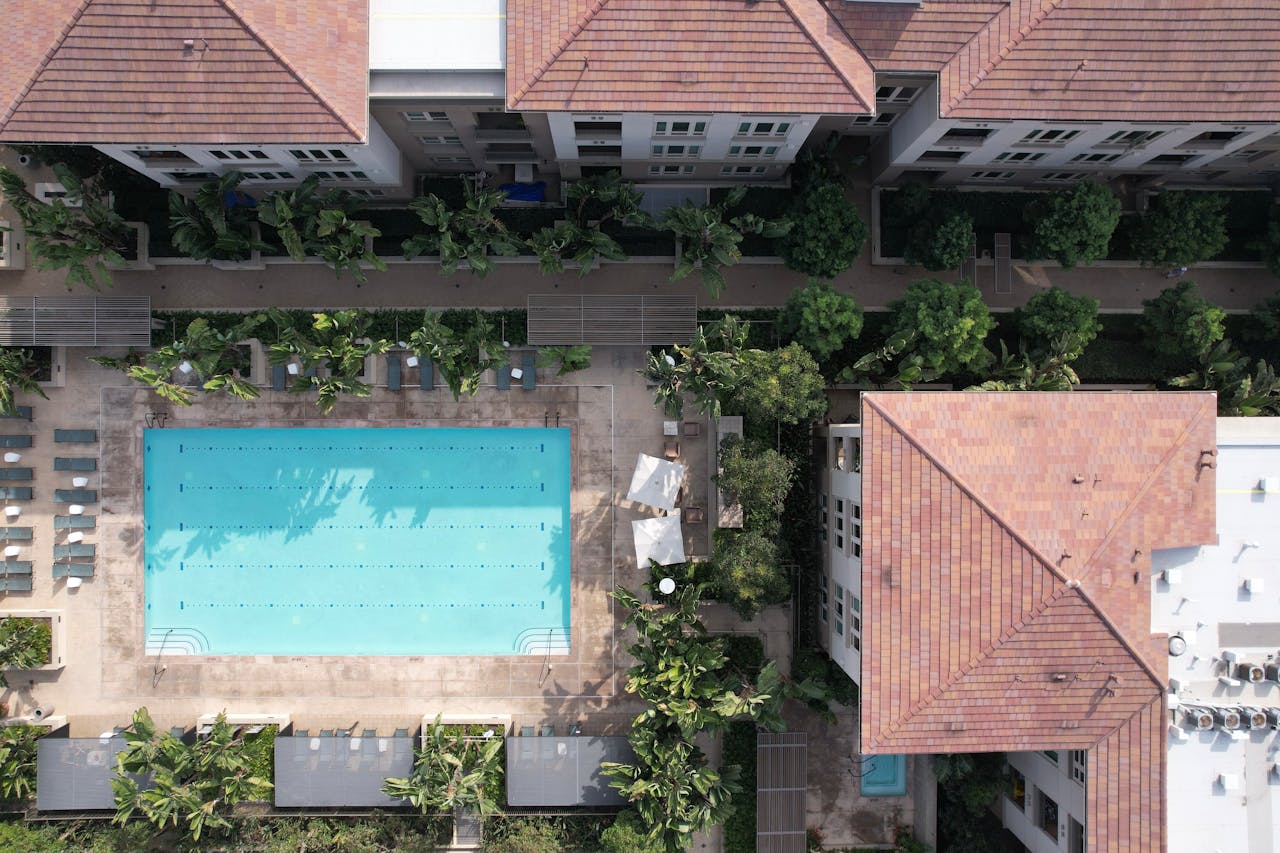 Free stock photo of aerial, apartment complex, pool